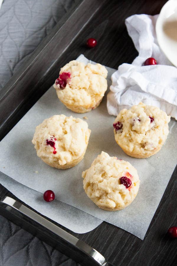 Tart Cranberry Scuffins are a hybrid of a scone and a muffin, and delectable slathered with warm butter and homemade jam for breakfast.