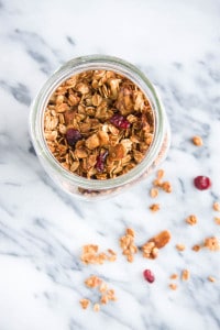 Holiday Gingerbread Granola is spiced with cinnamon, ginger, cloves, and molasses - make some to have on hand for Christmas guests!