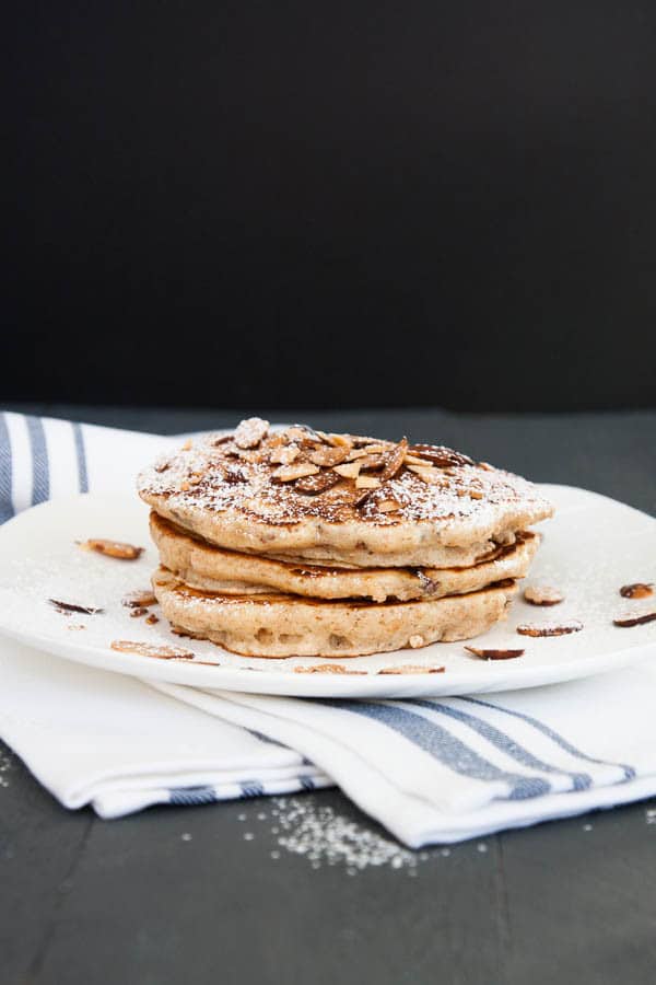 Almond Cranberry Whole Wheat Pancakes are made with 100% whole wheat flour and are 100% delicious!