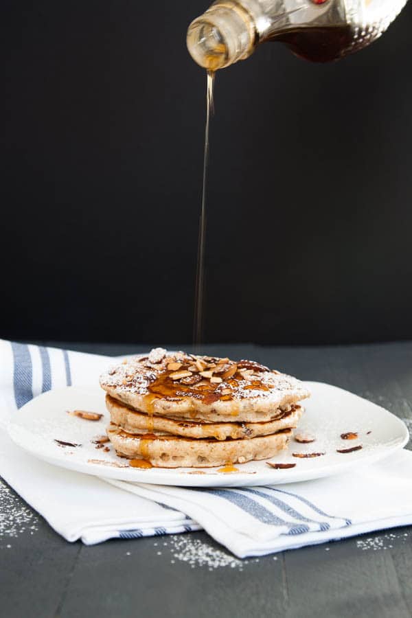 Slivered almonds provide a satisfying crunch, and the cranberries are soft pockets of flavour in these Almond Cranberry Whole Wheat Pancakes - a delicious Saturday morning breakfast.