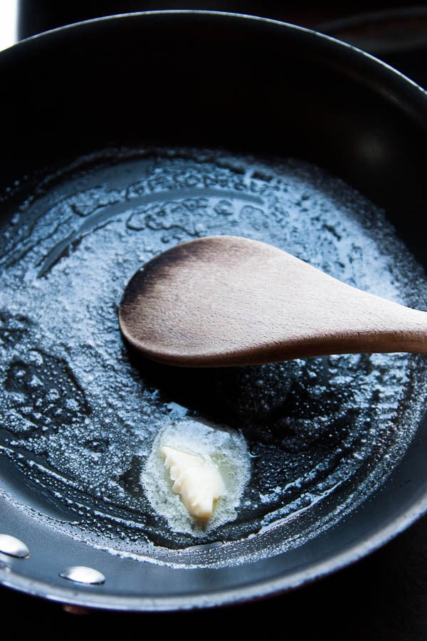 Melting butter for Fluffy Scrambled Eggs