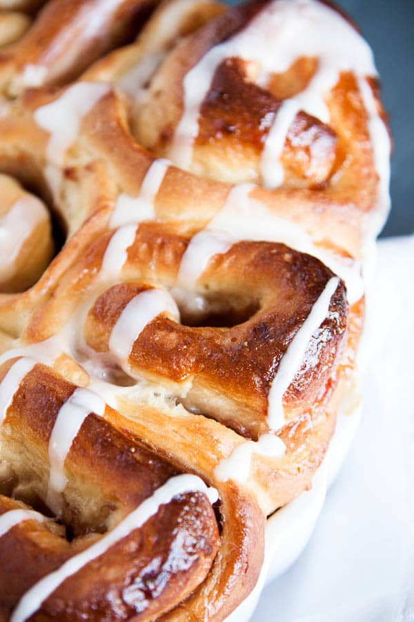 Strawberry Sticky Buns are like soft fluffy pillows rolled together with gooey strawberry jam, and drizzled with a tangy lemon glaze. 