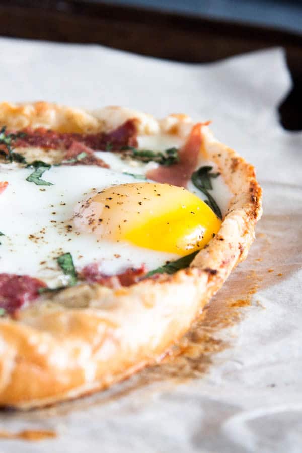 Breakfast Galette: filled with creamy ricotta and mozzarella cheese, and then topped with proscuitto, basil, and a big fat egg.