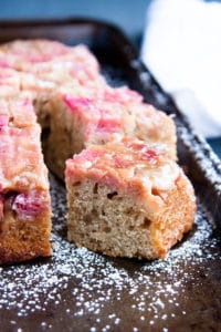 Upside-down Rhubarb Brunch Cake has a buttermilk cake base and is topped with tangy rhubarb laced with gooey caramel, which makes this already-moist cake irresistible.