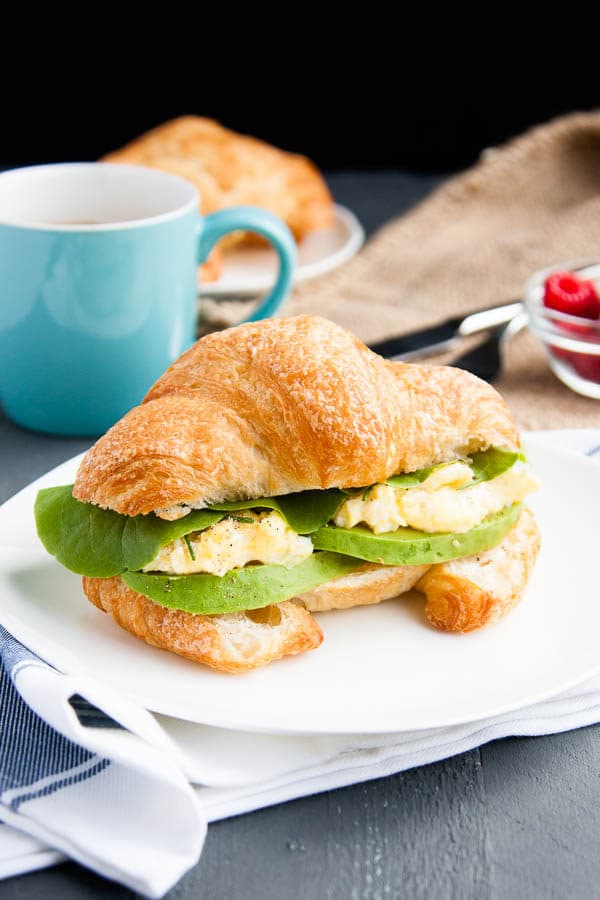 Take a flaky croissant, fluffy scrambled eggs, and slices of rich avocado, pair it with a few leaves of butter lettuce (I've used the lettuce from our garden!) and you have one helluva breakfast sandwich.