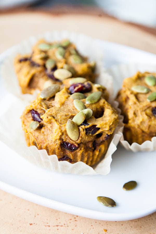 Fragrantly spiced with cinnamon, nutmeg, ginger and ground cloves, and kept moist by a full cup of pumpkin puree, these Pumpkin Cranberry Muffins are a celebration of October.