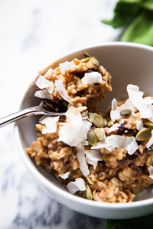 This bubbling pot of warm, creamy Stovetop Oatmeal is an homage to the autumn season with pumpkin puree, dried cranberries, pecans, and warming spices.