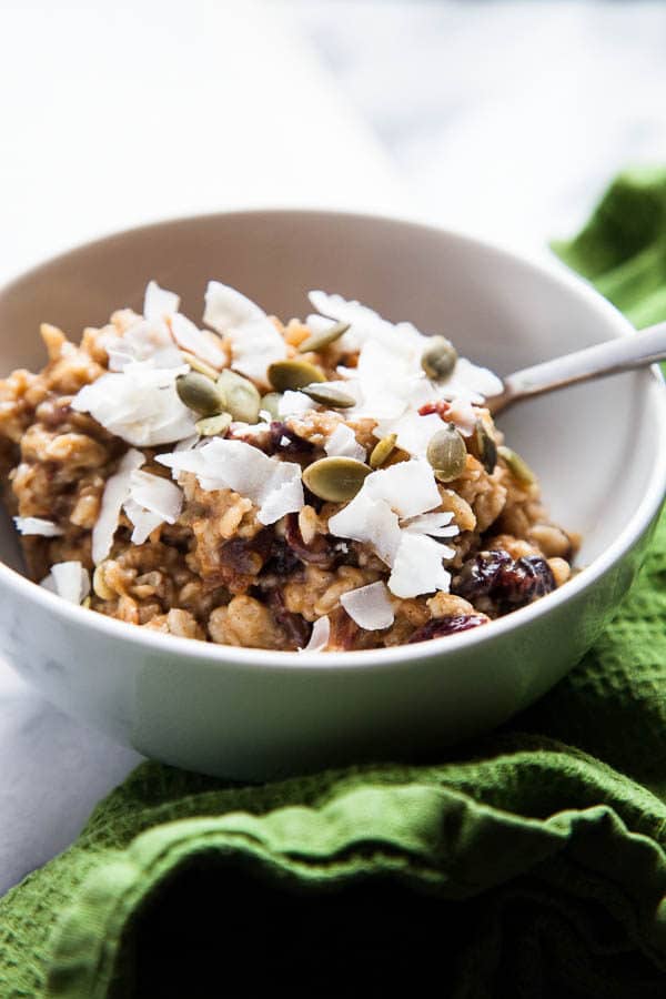 This bubbling pot of warm, creamy Stovetop Oatmeal is an homage to the autumn season with pumpkin puree, dried cranberries, pecans, and warming spices.