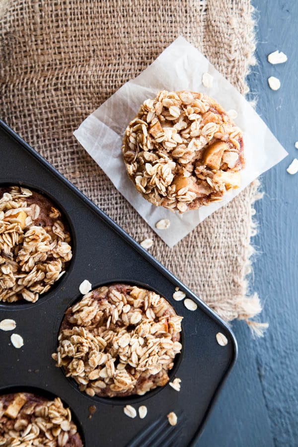 Baked Apple Cinnamon Oatmeal is prepared in muffin cups to take to go! | Breakfast for Dinner