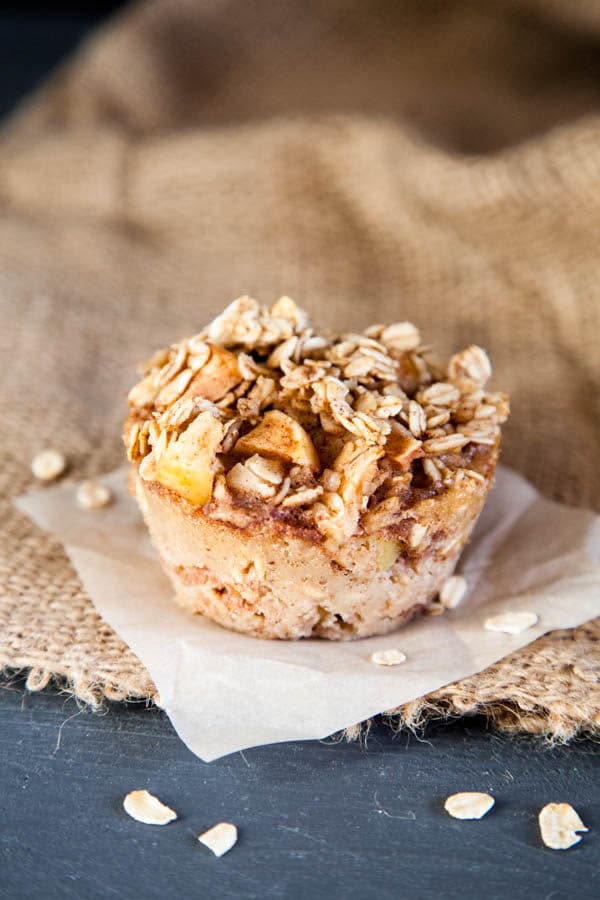 Baked Apple Cinnamon Oatmeal is prepared in muffin cups to take to go! | Breakfast for Dinner