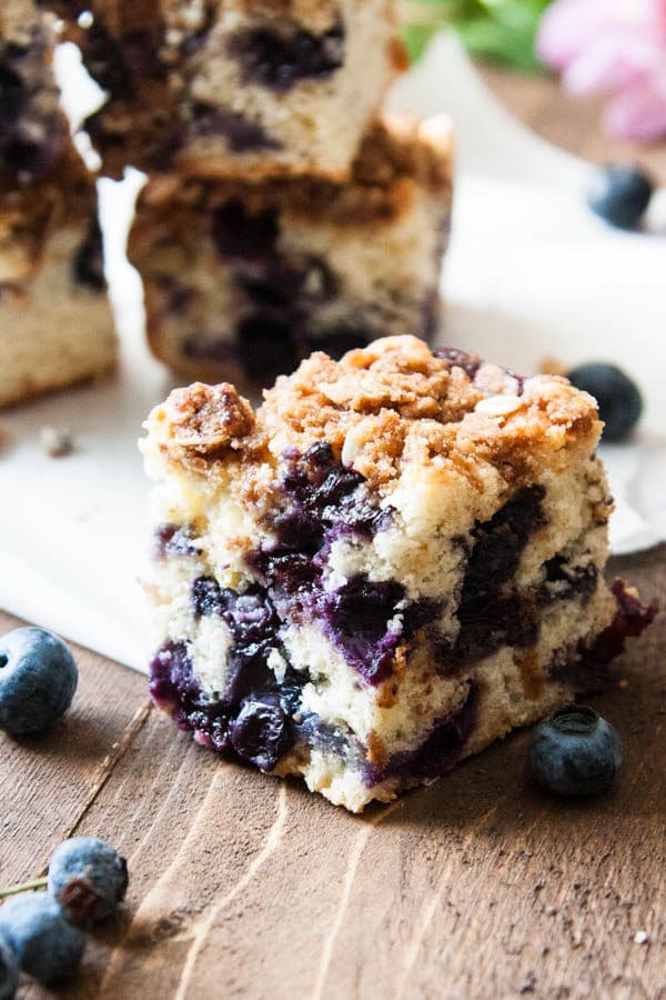 Blueberry Brunch Cake is packed with juicy blueberries, a hint of lemon zest, and generously sprinkled with a crumbly brown sugar oat topping. Perfect for a brunch party!