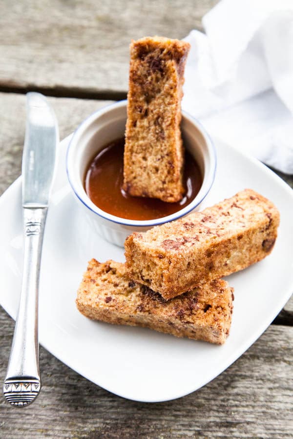 French Toast you can eat with your fingers! Rolled in a crunchy cinnamon sugar coating and ready to be dunked in maple syrup!