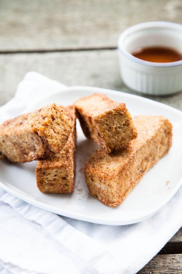 French Toast you can eat with your fingers! Rolled in a crunchy cinnamon sugar coating and ready to be dunked in maple syrup!