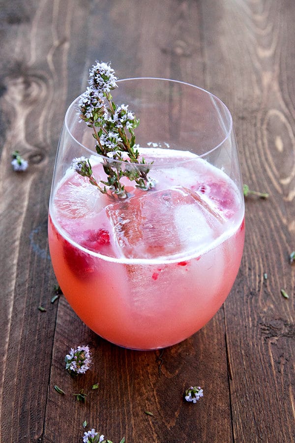 This Raspberry Gin Fizz is a delicate berry-filled cocktail splashed with a hint of soda water and lime for a light, refreshing drink. Most of the ingredients you already have on hand in your kitchen!