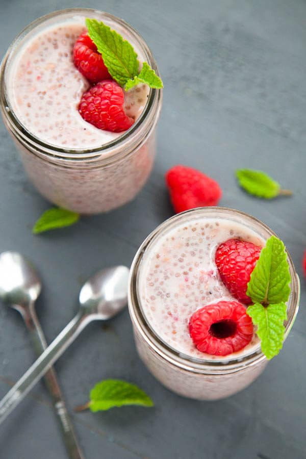 Beautiful pink berries are stirred in with chia seeds and milk to create a simple and nutritious Raspberry Chia Pudding breakfast.