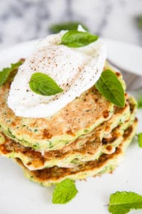 Zucchini Feta Fritters use the freshest summertime flavours - filled with shaved zucchini, chopped mint, and basil, you might already have the ingredients growing in your garden! 