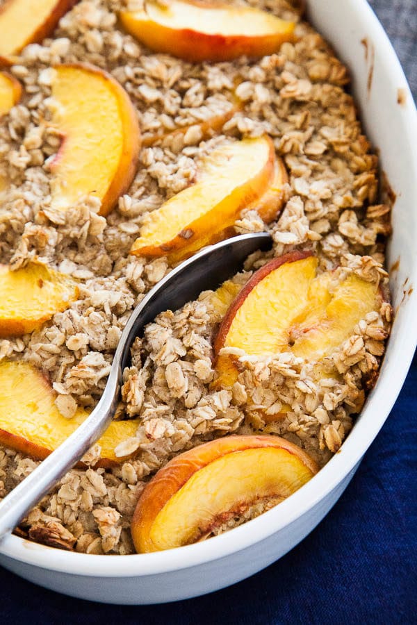 Warm your kitchen with a cozy bowl of Baked Peaches and Cream Oatmeal, while the mornings are still cool and the markets are still stocked with peaches.
