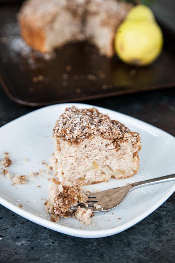 Spiced Pear Crumble Cake is packed with juicy pear, warm cinnamon, and generously sprinkled with a crumbly brown sugar oat topping.