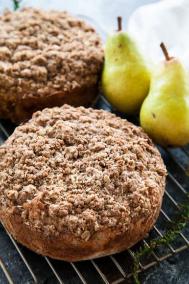 Spiced Pear Crumble Cake is packed with juicy pear, warm cinnamon, and generously sprinkled with a crumbly brown sugar oat topping.