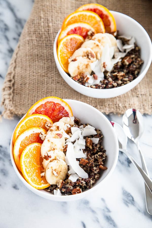 Quinoa is not just for dinner - try it for breakfast with these hearty, nutritious breakfast quinoa bowls, swirled with vanilla, cinnamon, and creamy milk.