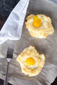 Cloud Eggs are a fun new way to eat eggs for breakfast: you get light, fluffy whites with a perfectly runny yolk. The absolute best of both worlds.