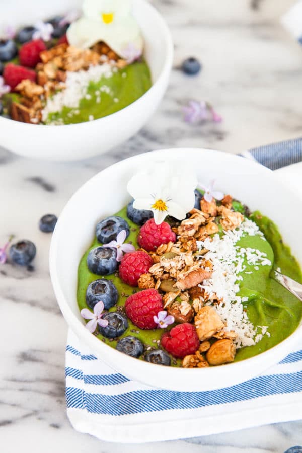 Smoothie bowls are a heartier and more filling breakfast than a smoothie. Load up on toppings - my favourites are homemade granola and shredded coconut. Recipe makes one very large or two smaller smoothie bowls.