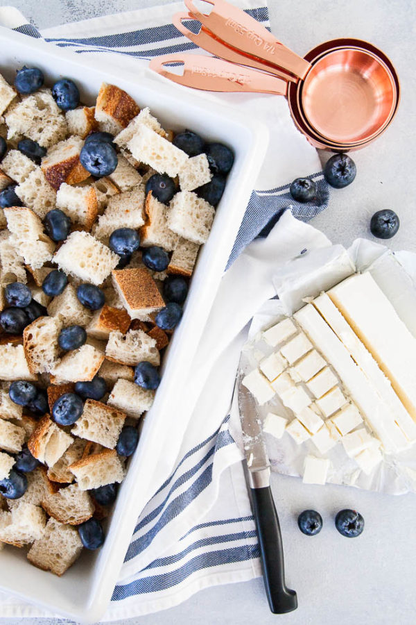 Assembling Blueberry Cream Cheese French Toast Bake